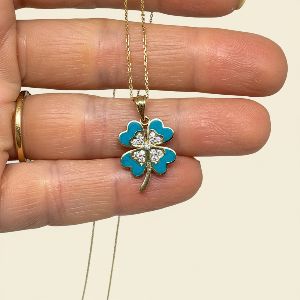 Four-Leaf Clover Pendant in Hand - Premium Background
